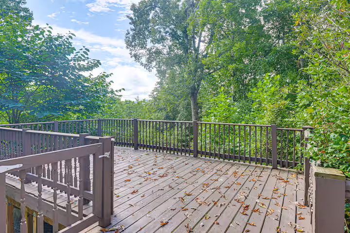 Outdoor deck with mountain views at large group cabin Franklin NC